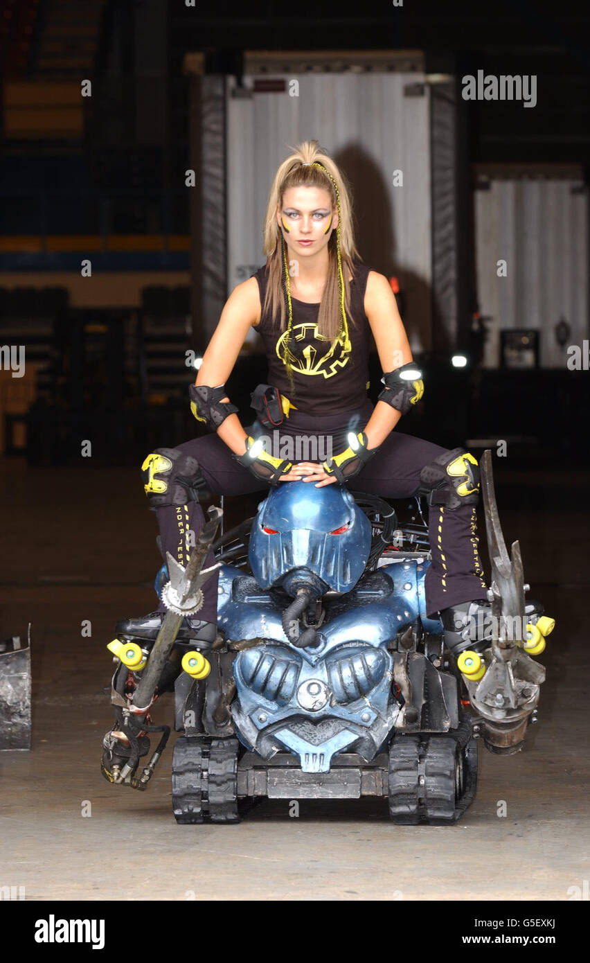 Robobabe Jane Victory with one of the the house robots promoting The Robot Wars Live Event, taking place at the London Arena and at the Wembley Arena. Stock Photo