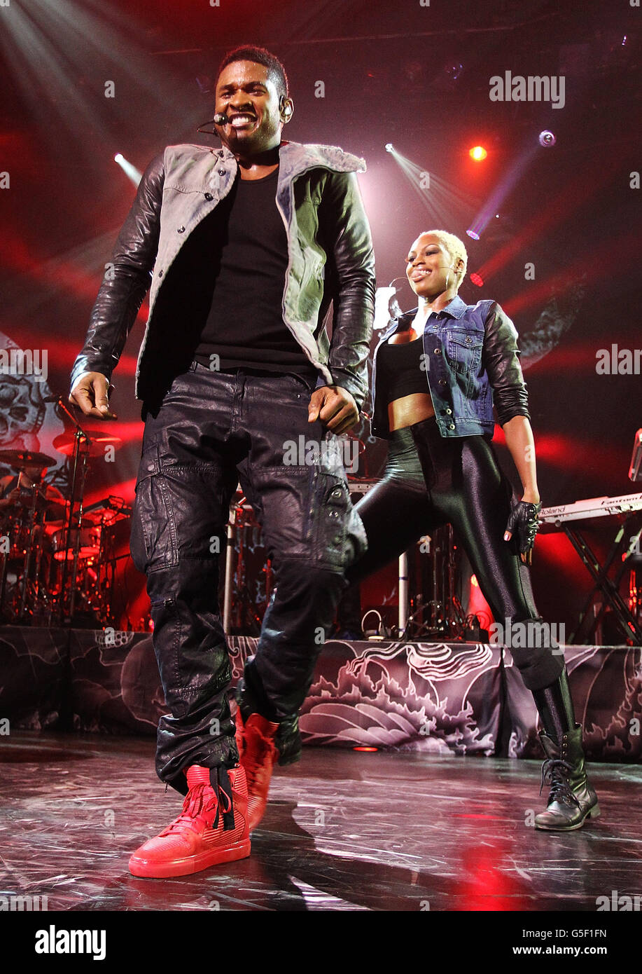 Usher, with his dancers, performs on the first day at the iTunes Festival at the Roundhouse in London. Stock Photo