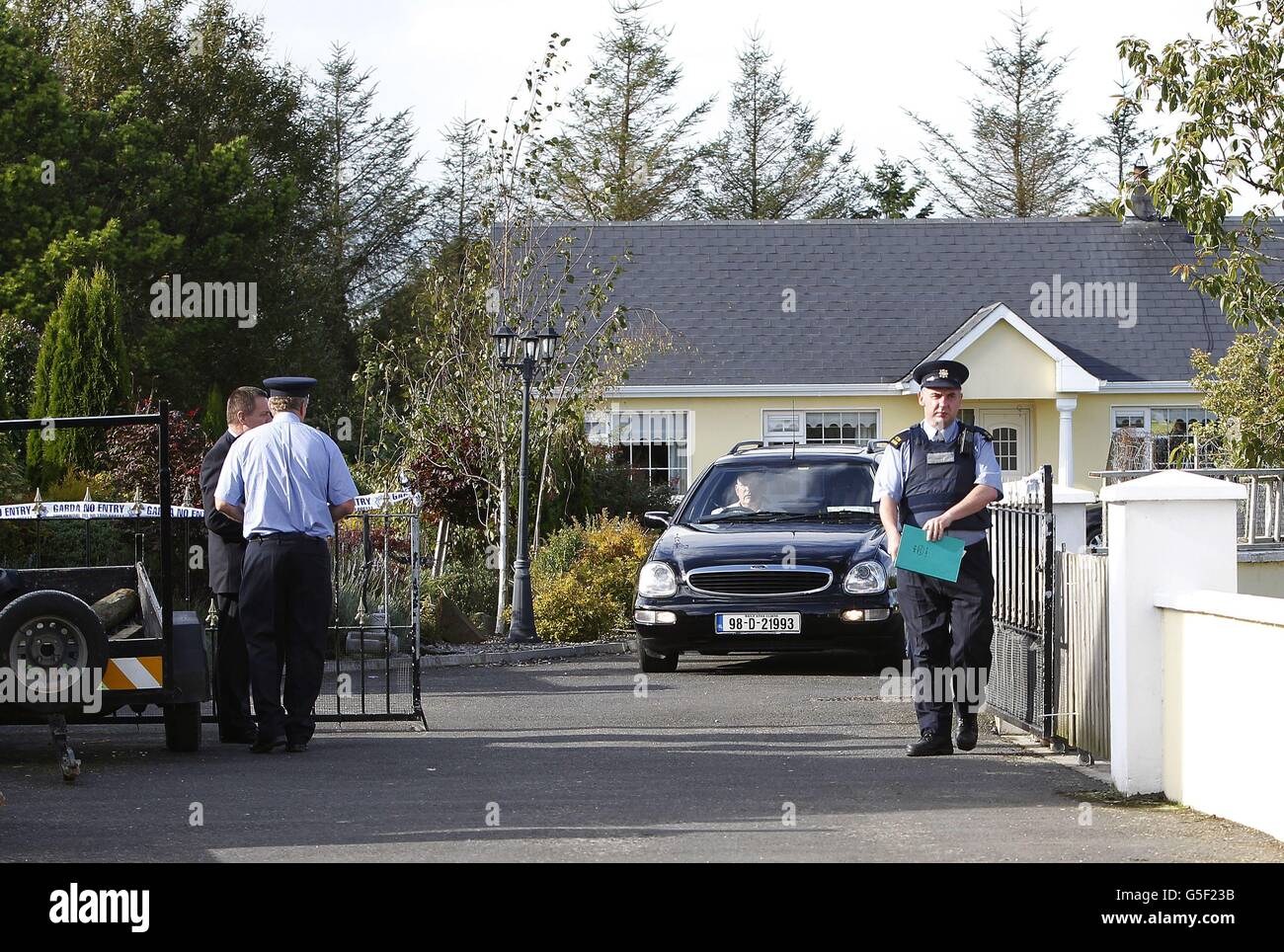 A hearse carrying the coffin of Anthony Ward, 8, leaves the house in Harrison Place, Charleville, Co Cork, after he was found dead in his bed today. Stock Photo