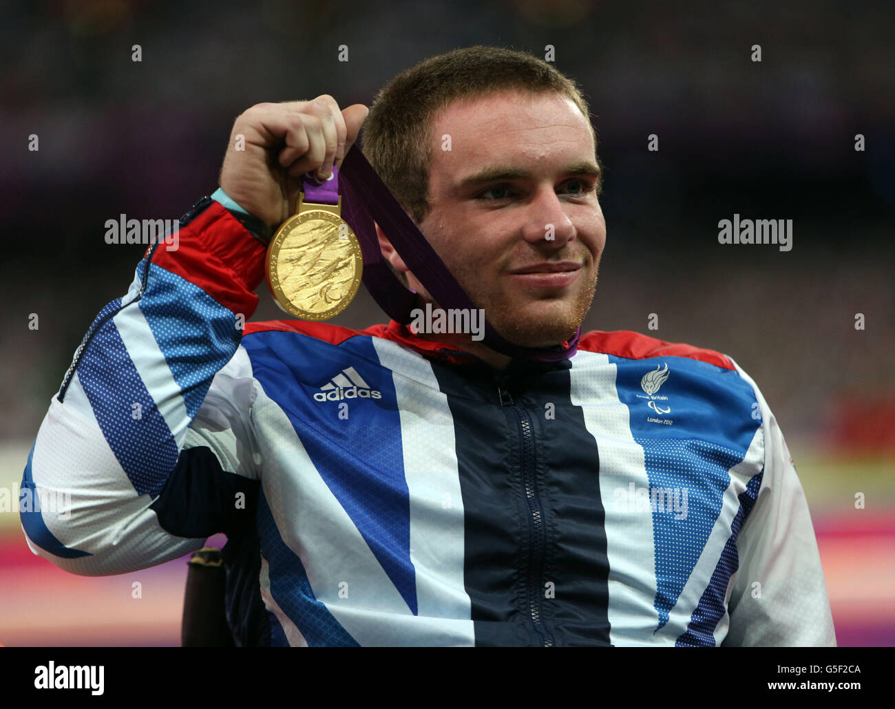 Great Britain's Mickey Bushell Celebrates Winning Gold In The Mens 100m ...