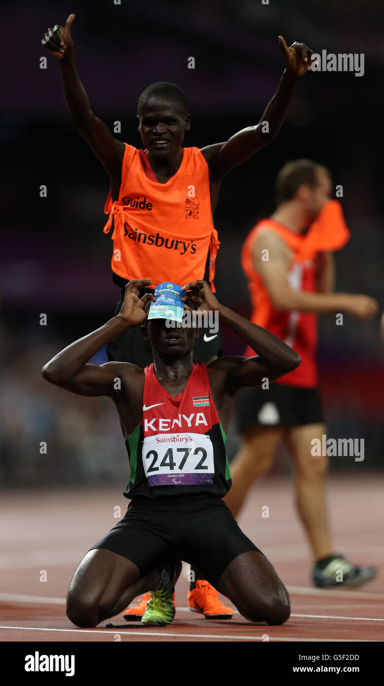 Kenya's Samwel Mushai Kimani celebrates winning the Men's 1500m T11