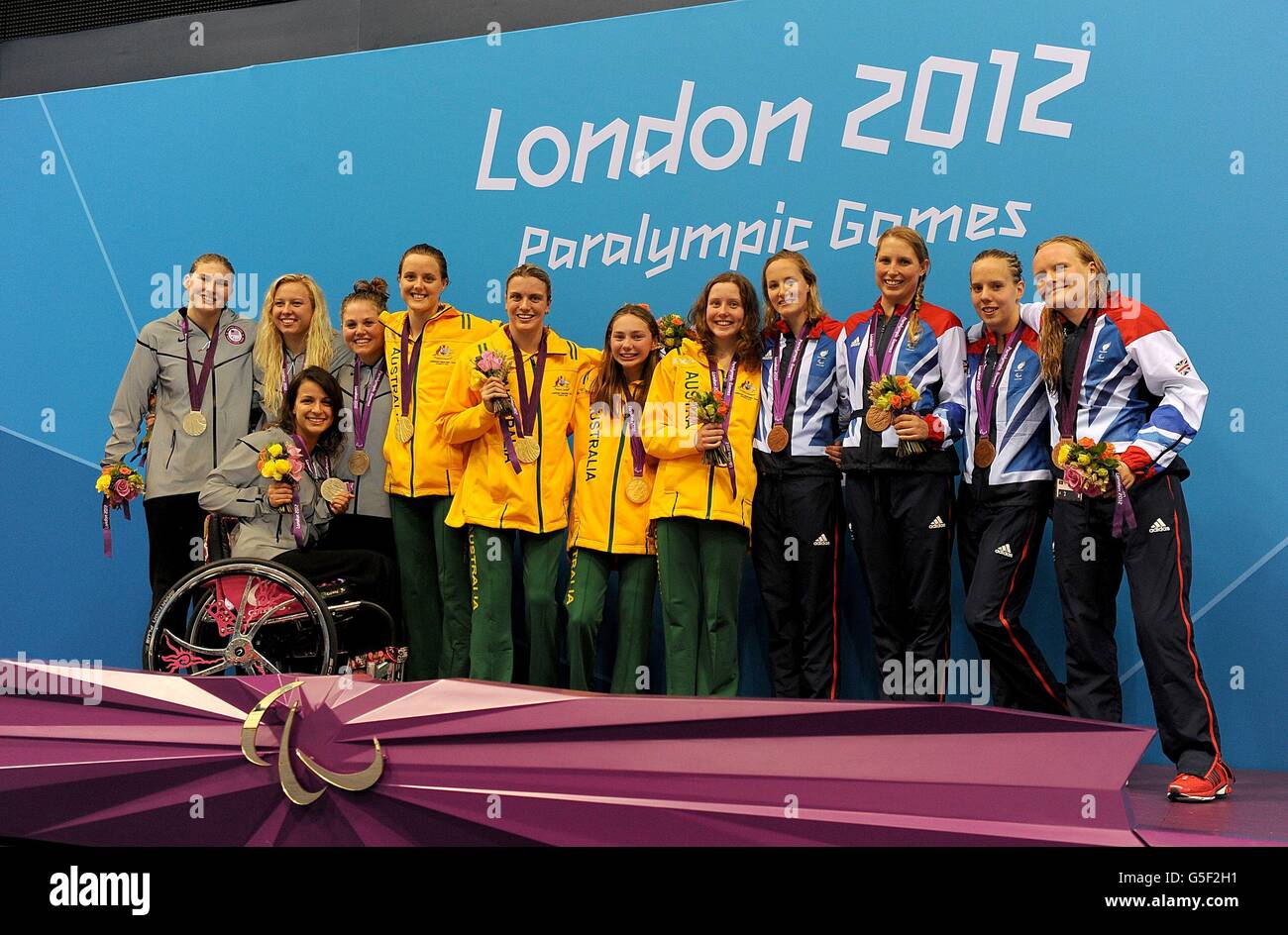 The Women's 4x100m Freestyle Relay Teams Of Australia (centre), USA ...