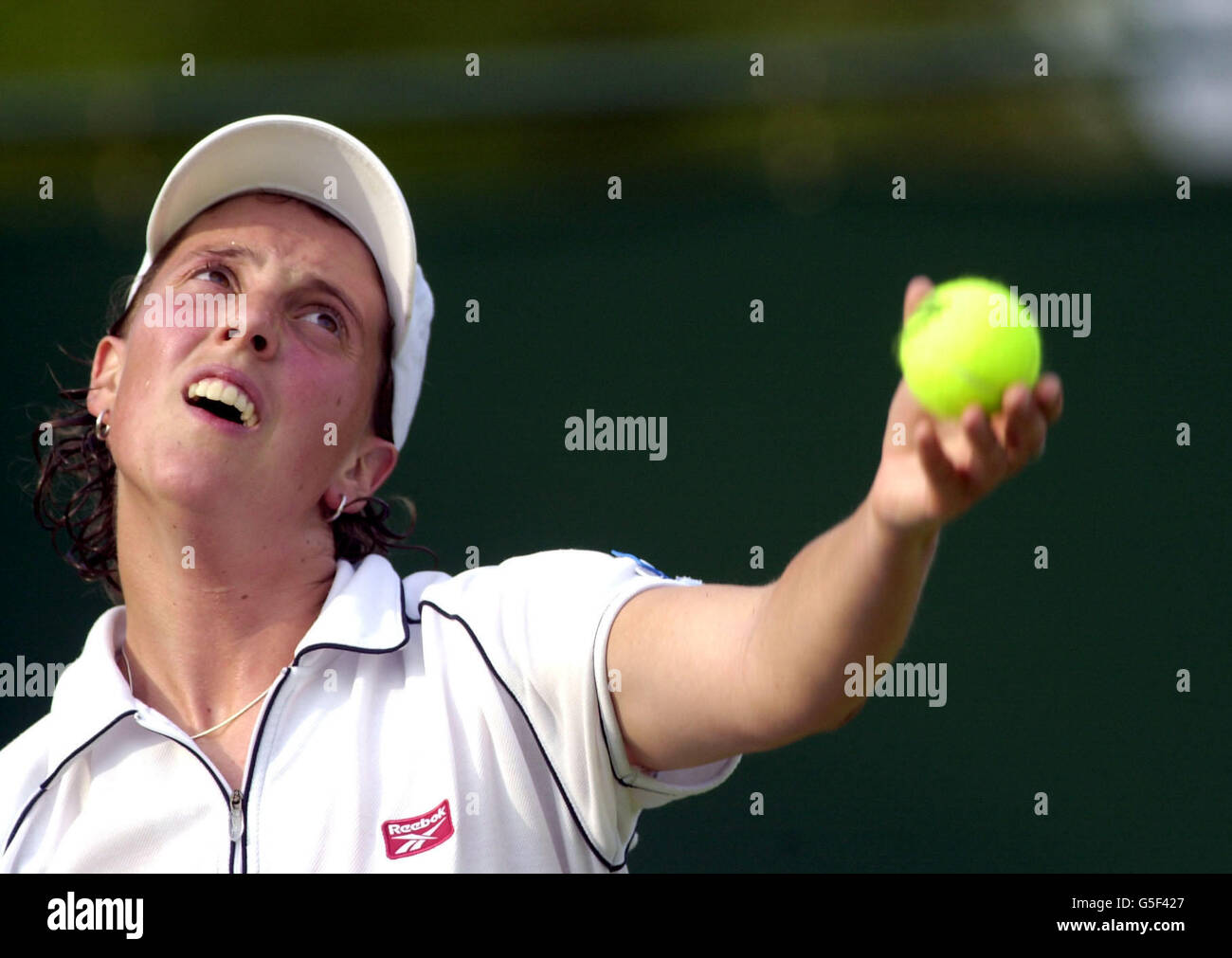 NO COMMERCIAL USE: Great Britain's Lorna Woodroffe in action against Iroda Tulyaganova during the First Round match of the Lawn Tennis Championships at Wimbledon, London. Stock Photo