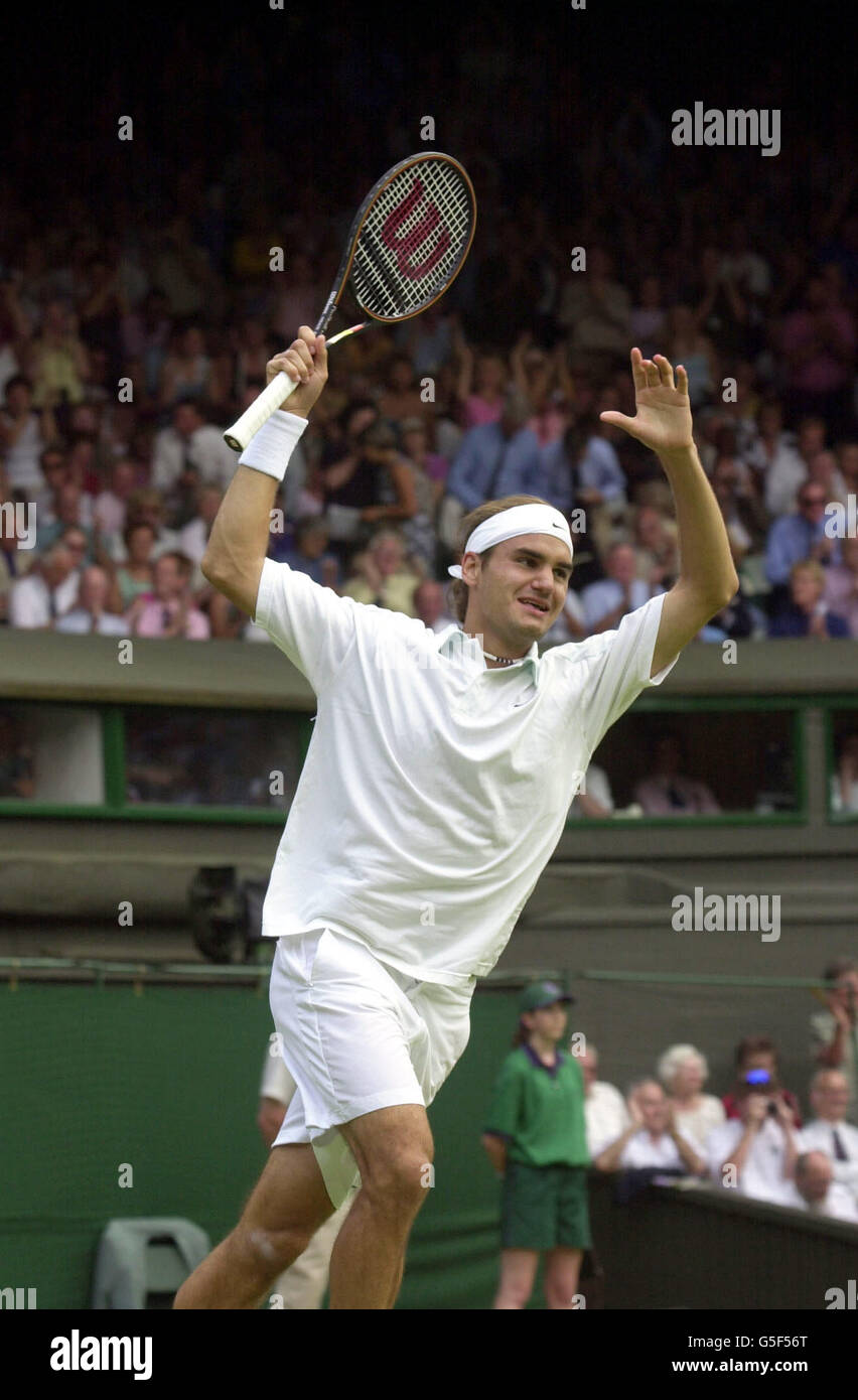 Switzerland's Roger Federer celebrates his victory over USA's Pete Sampras  during their Fourth Round match of the 2001 Lawn Tennis Championships at  Wimbledon, London Stock Photo - Alamy