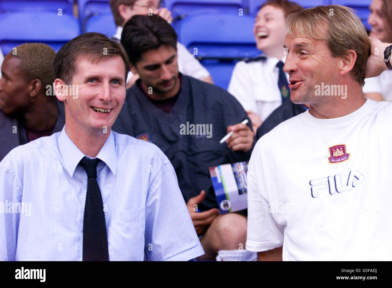 West Ham United's new manager Glenn Roeder (left) talks with Paul Goddard his first team coach, during the pre-season friendly game against Peterborough United at London Road, Peterborough. Stock Photo