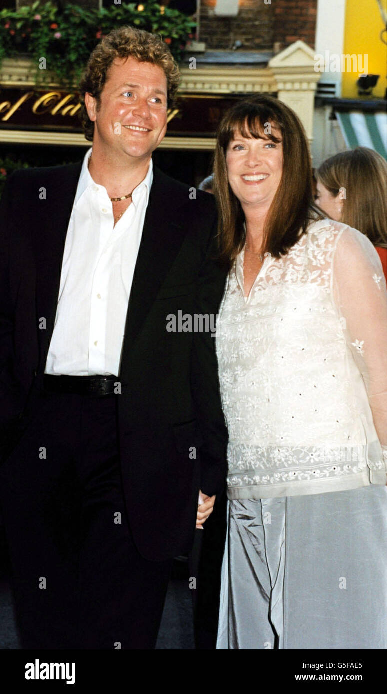 Michael Ball and Cathy McGowan arriving at the Theatre Royal, Drury Lane, London for the production of My Fair Lady which has been transferred from the Royal National Theatre. Stock Photo