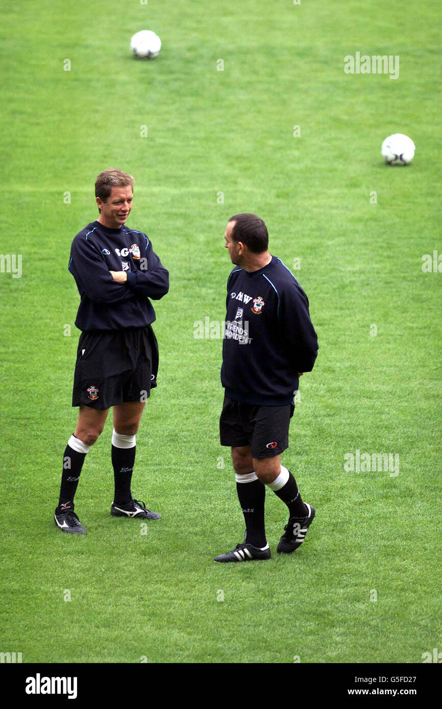 The Southampton FC management of Stuart Gray (left) and Mick Wadsworth watch their players train on the pitch of their new stadium, St Mary's. The club moved across the city from their former home, The Dell where they played fror more than 100 years, at the end of last season. 21/10/01: Gray was sacked by Southampton. Stock Photo