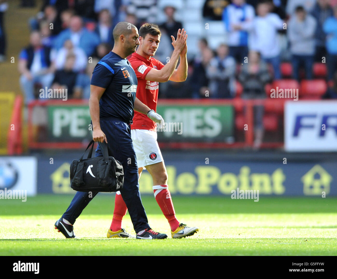 Johnnie Jackson of Charlton leaves the field injured during the npower Football League Championship match at The Valley, Charlton. PRESS ASSOCIATION Photo. Picture date: Saturday September 29, 2012. See PA story SOCCER Charlton. Photo credit should read: PA Wire. Stock Photo