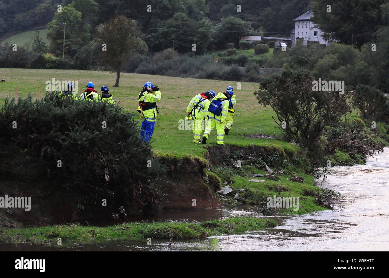 Coast guards search a river outside Machynlleth for missing girl April Jones. Stock Photo