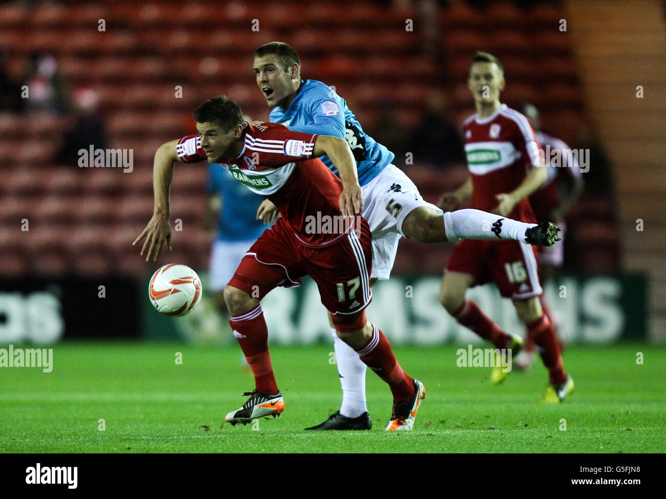 Middlesbrough's Lukas Jutkiewicz and Derby County's Jake Buxton battle for possession of the ball Stock Photo