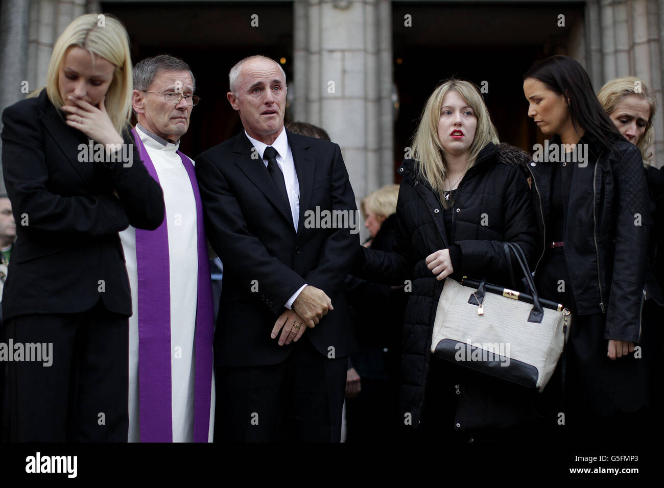 Uncle Michael McKeon (3rd left) with family members (names not known) attending a Memorial Mass for murdered Irish woman Jill Meagher at St Peter's Church, Drogheda, Co Louth. Stock Photo