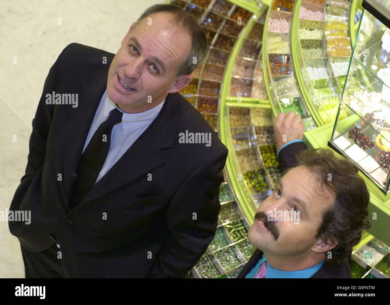 Chief Executive of Selfridges PLC, Vittorio Radice (left) with his Finance Director Peter Williams inside Selfridges central London store, on the eve of the announcement of the company's interim results. 09/12/02 : Selfridges boss Vittorio Radice, 45, who is being given a 1.2 million golden hello to jump ship and join Marks & Spencer. The Italian will also pocket an annual salary of 425,000, with the chance of doubling his money if performance targets are met. He is leaving Selfridges to run M&S s growing Home division, which sells sofas, lighting and bed linen in 25 stores across the UK. Stock Photo