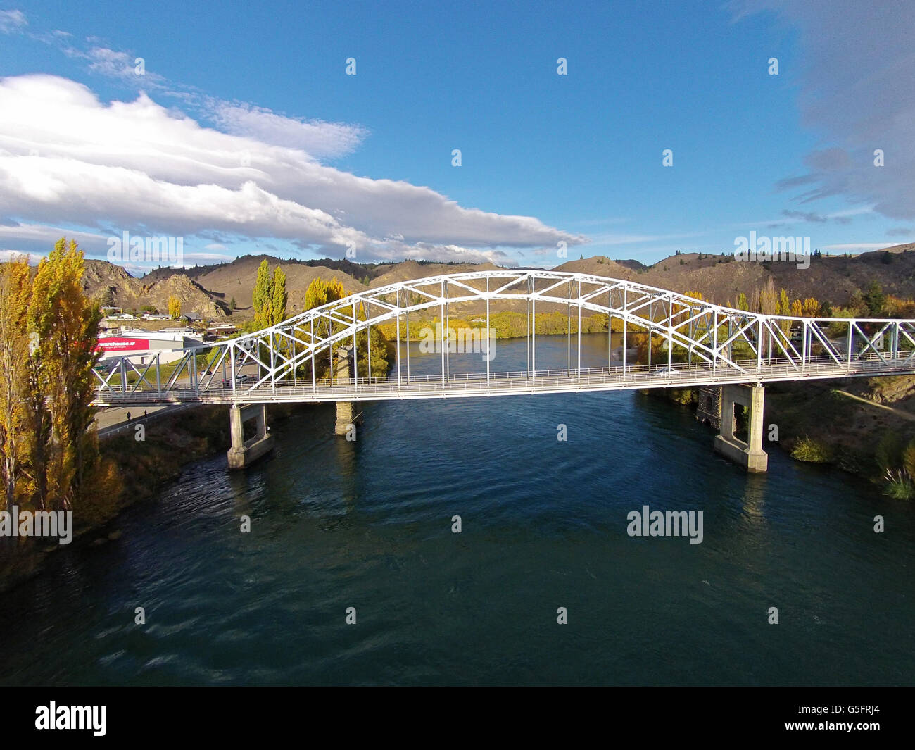 Alexandra Bridge and Clutha River in autumn, Central Otago, South Island, New Zealand - drone aerial Stock Photo