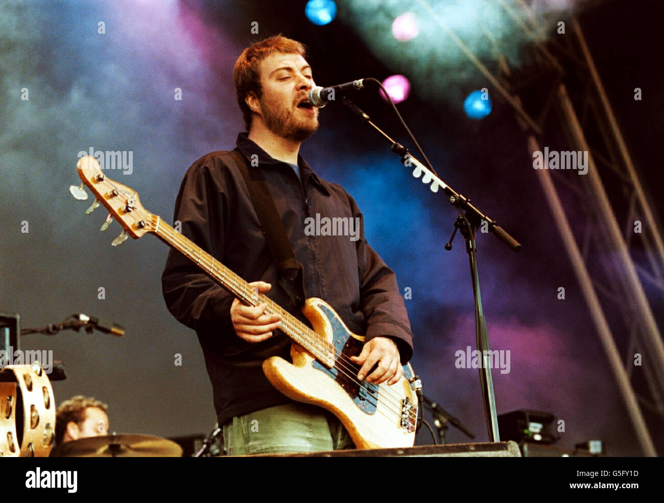 Lead singer and bass guitarist for the rock band doves hires stock