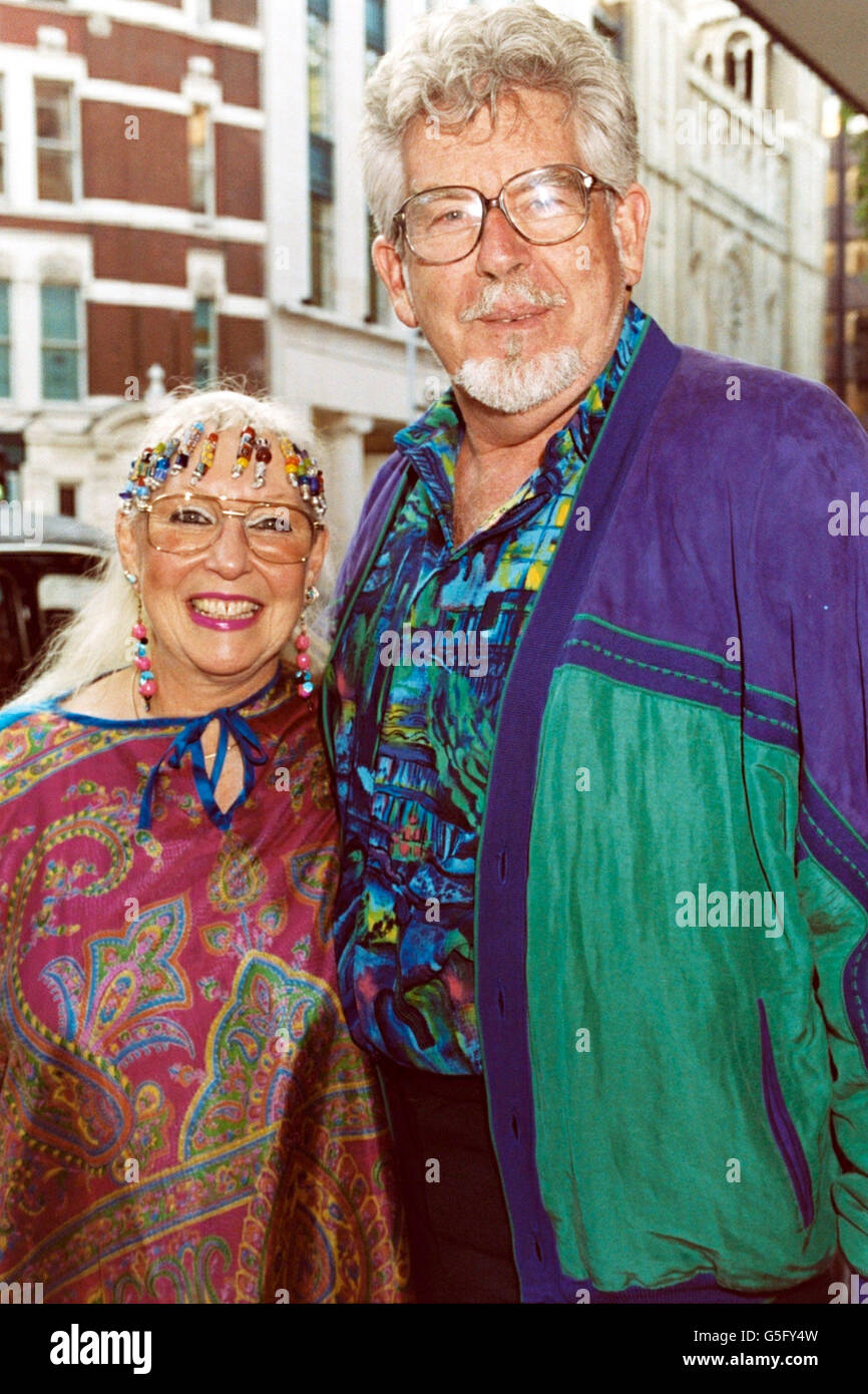 TV presenter Rolf Harris with his wife Alwen attending the press preview of the new West End musical Peggy Sue Got Married at the Shaftesbury Theatre , London. Stock Photo