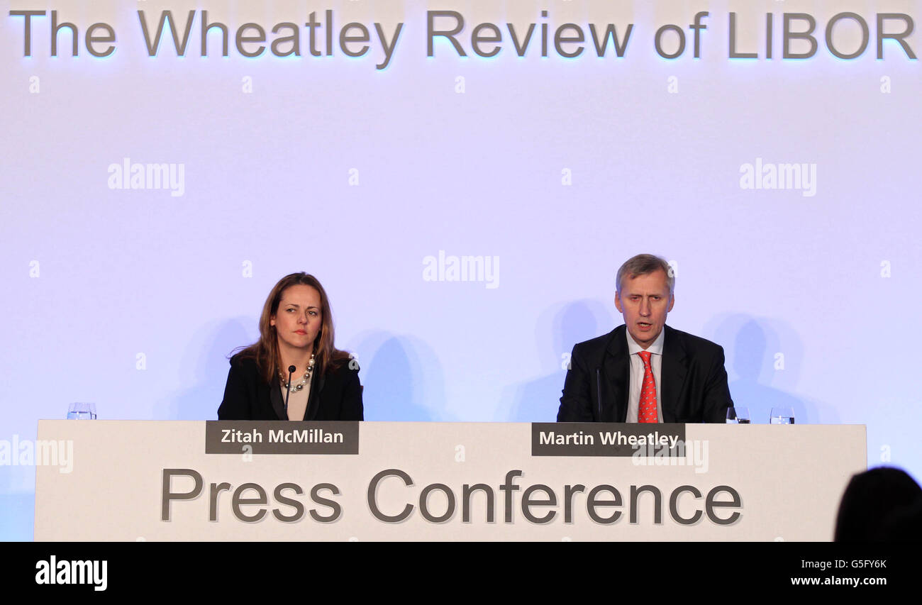 Zitah McMillan (left) with Martin Wheatley as he gives a speech on his recommendations for reforming the Libor system at Mansion House, London. Stock Photo