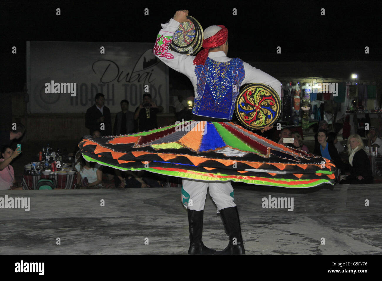 The Tanoura Dance, at Sundowner Dune Dinner Safari, Dubai, UAE Stock