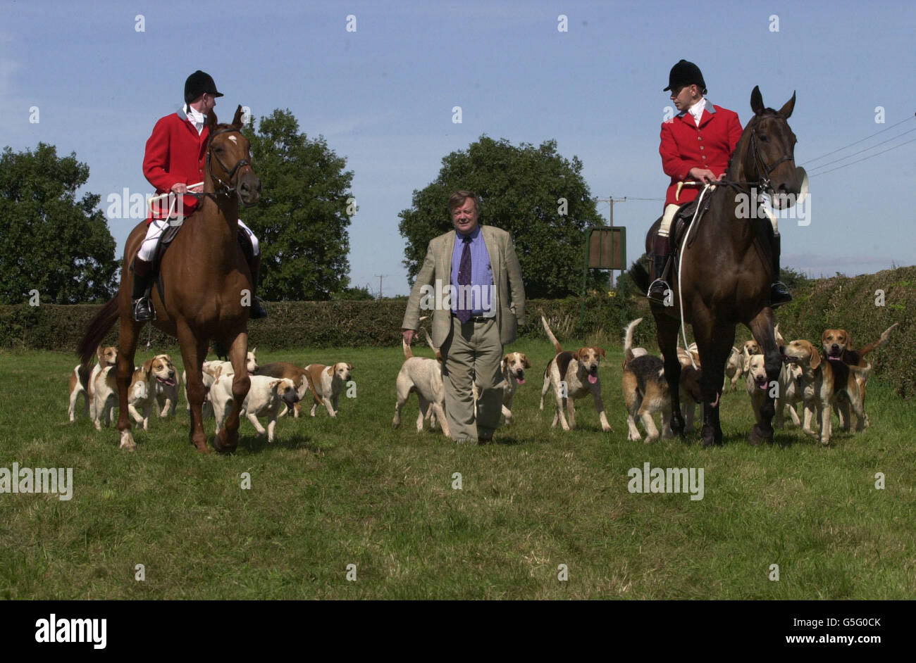 Tory Leadership candidate Kenneth Clarke at the Moorgreen Country Fair in Nottinghamshire with members of the South Nottinghamshire hunt, Whipper-In Roger Ogden (left) and Huntsman Gary Williams. Stock Photo