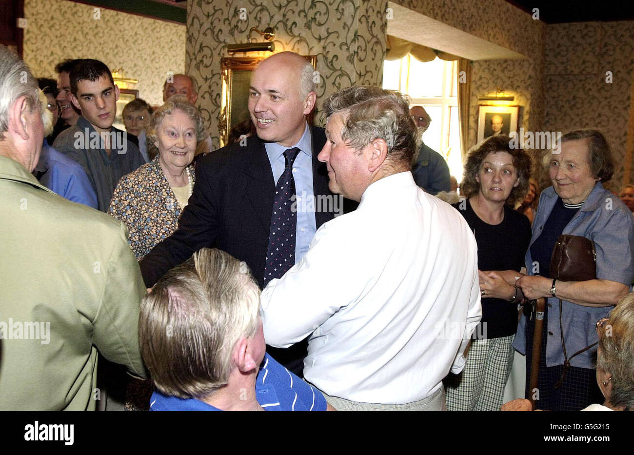 Tory leadership challenger Iain Duncan Smith greets the Tory party faithful at the Conservative Club in New Milton, Hampshire. He also addressed 300 Conservative Party members for 45 minutes in the Winston Churchill lounge. * although the media were excluded from the meeting, as the members left the meeting there was little doubt that the majority favoured Duncan Smith over rival Ken Clarke. Stock Photo