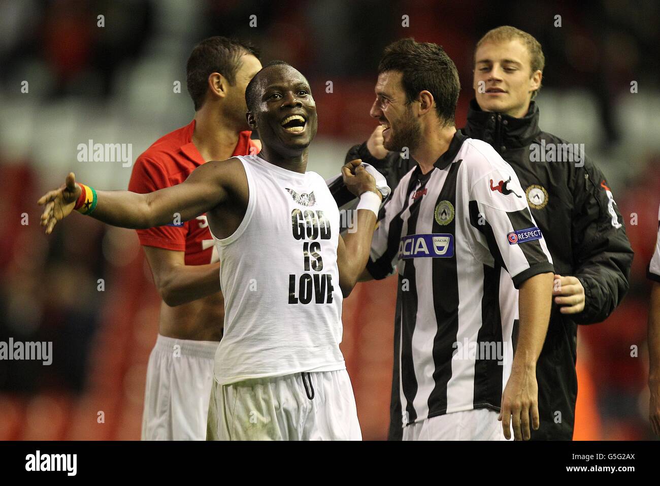Udinese's Andrea Lazzari and Emmanuel Agyemang-Badu (left) celebrate victory after the final whistle Stock Photo
