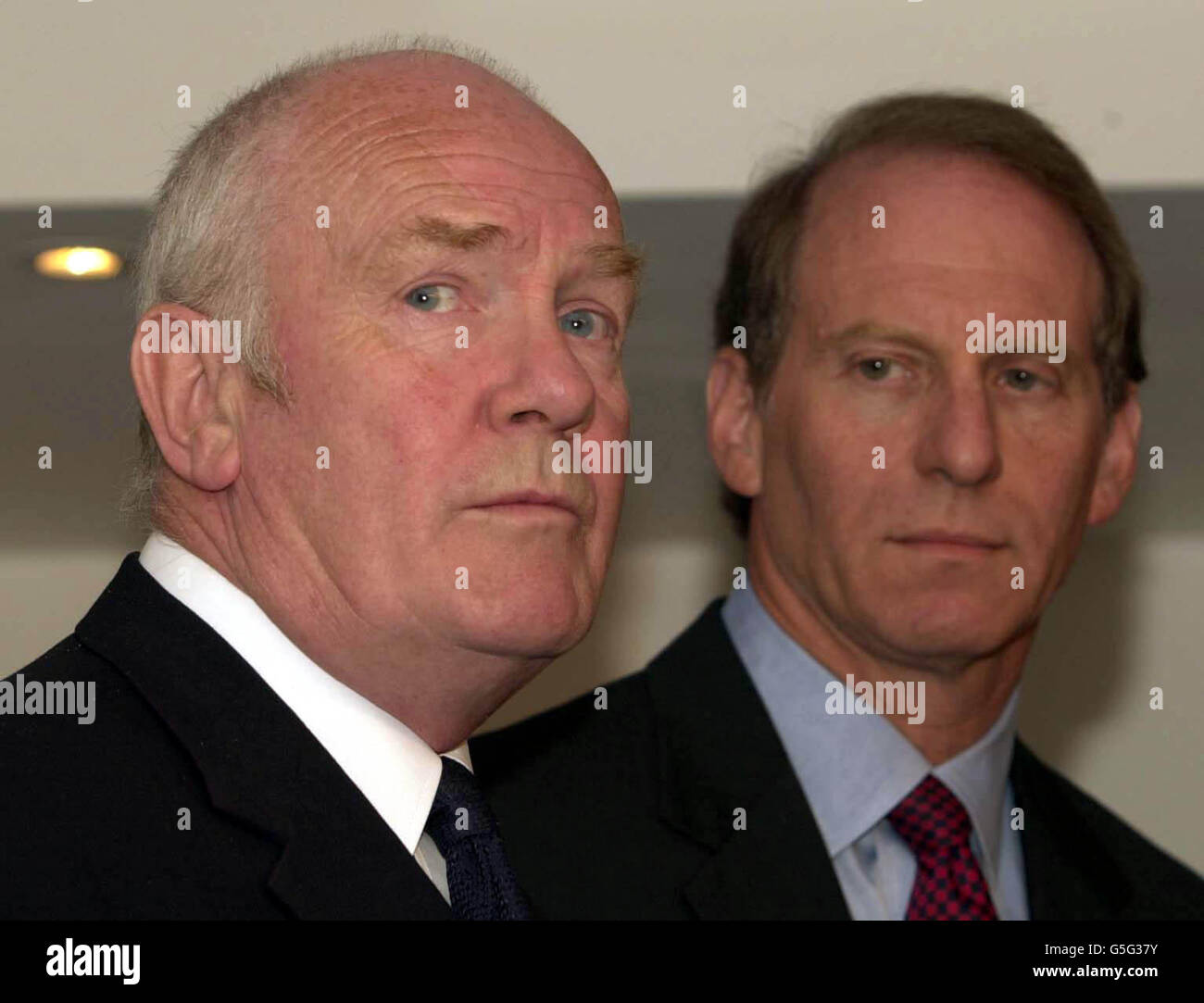 Northern Ireland Secretary, Dr John Reid (L), with US President George W Bush's special Northern Ireland envoy Richard Haass, in London. Mr Haass was starting his scheduled visit to Britain as parents and children from the Holy Cross primary school in Belfast. * prepared for a second week of loyalist protests, Lord Taylor of Kilclooney accused the Northern Ireland Secretary and his colleagues of 'sitting on their hands' over the summer and failing to prevent last week's bitter scenes in Ardoyne. Mr Haass is due in Belfast tomorrow. Stock Photo