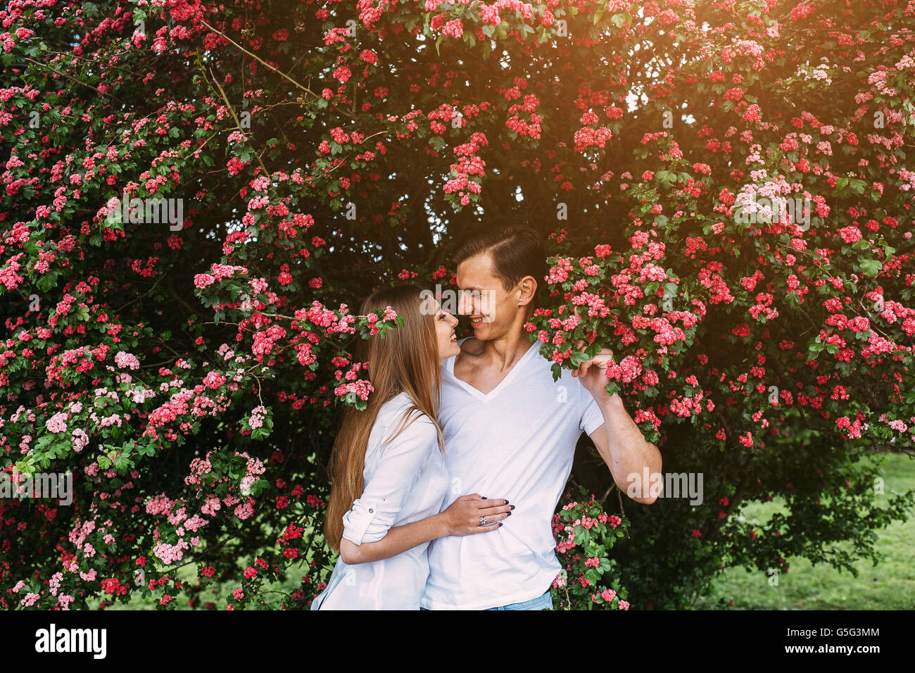 Young happy couple in love outdoors Stock Photo - Alamy