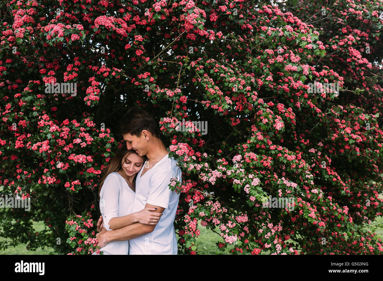 Young happy couple in love outdoors Stock Photo - Alamy