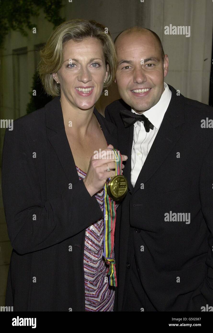 Sally Gunnell with husband John Bigg arrive at the Savoy Hotel in London, to attend the innaugural British Olympians Gold ball, in honour of medal winners. Sally won her gold medal for 400 metres hurdles in Barcelona 1992. Stock Photo