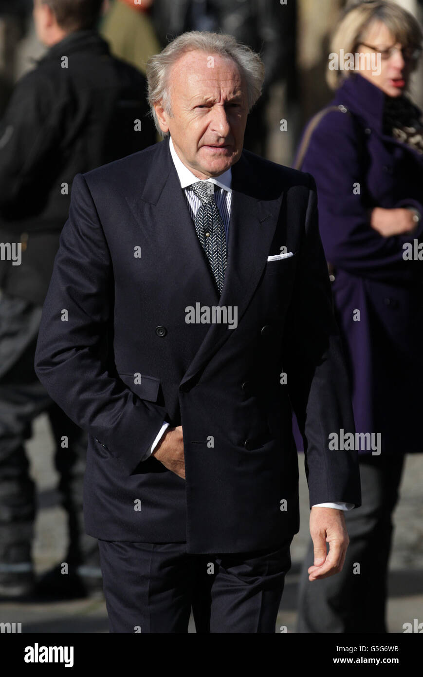 British retail entrepreneur Harold Tillman arrives at St Paul's Cathedral in London, for the memorial service of hairdresser Vidal Sassoon who died in May. Stock Photo