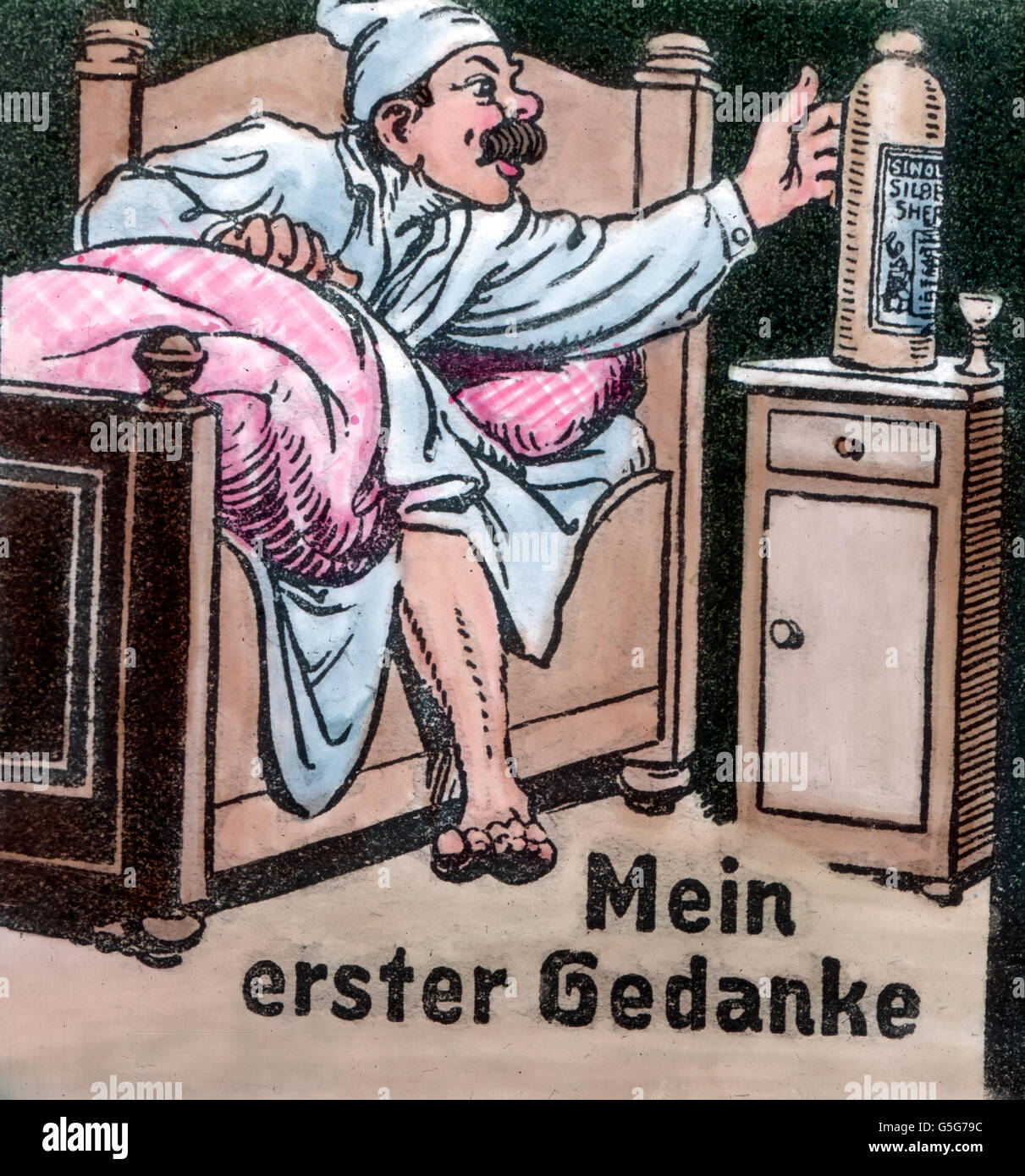 Sein erster Gedanke. First of all... man, bed, bedroom, bottle, spirits, drinking, waking up, illustration, alcohol, drug, history, historical, 1910s, 1920s, 20th century, archive, Carl Simon, hand coloured glass slide Stock Photo