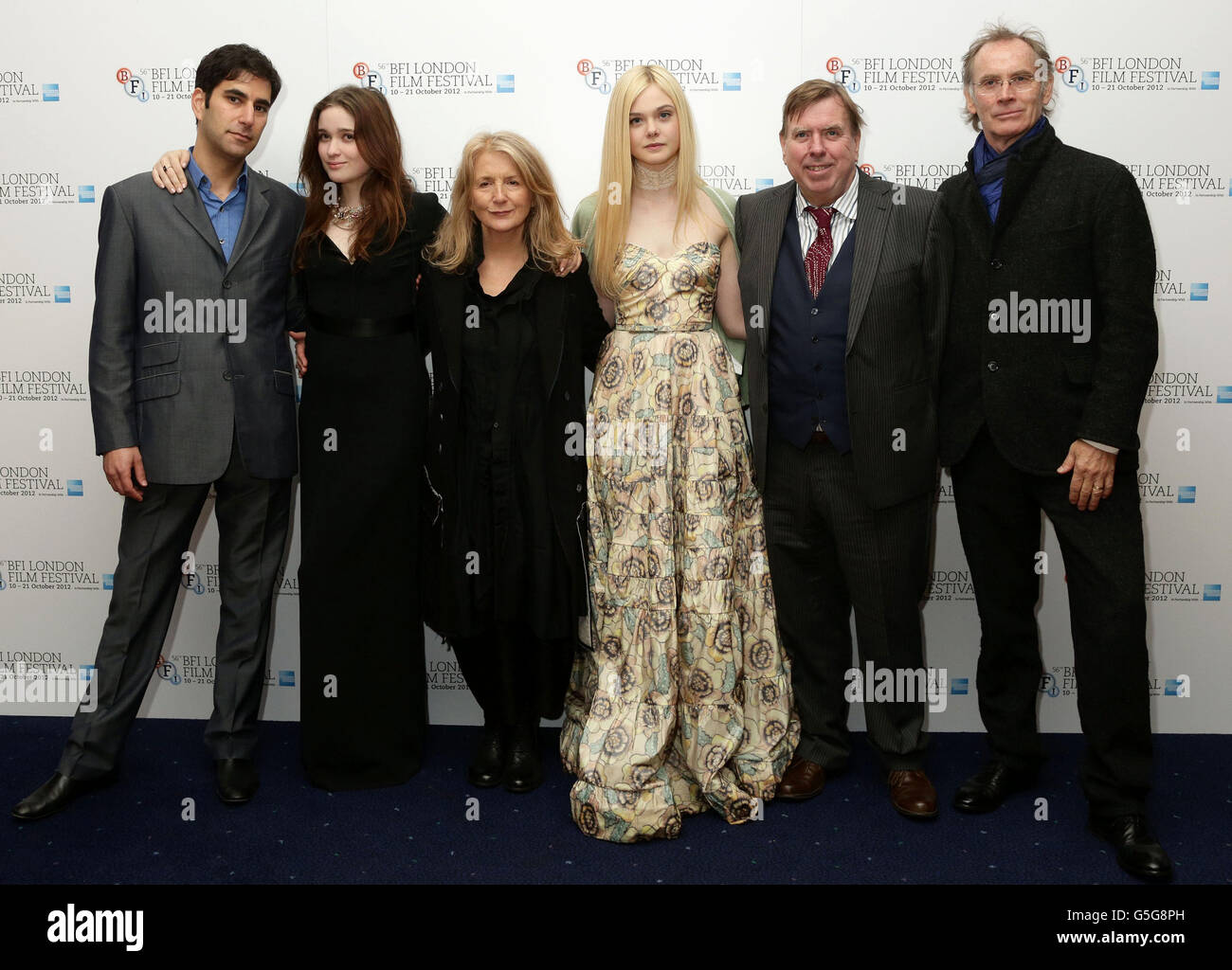 (left to right) producer Andrew Litvin, Alice Englert, director Sally Potter, Elle Fanning, Timothy Spall and producer Christopher Sheppard arriving for the BFI London Film Festival screening of Ginger And Rosa, at the Odeon West End, Leicester Square in central London. Stock Photo