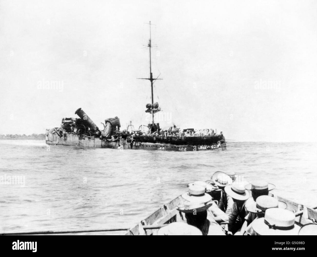 British sailors view the wreck of the German raider, The Emden, which was attacked by ships of the Royal Australian Navy after causing havoc with Allied shipping. Stock Photo