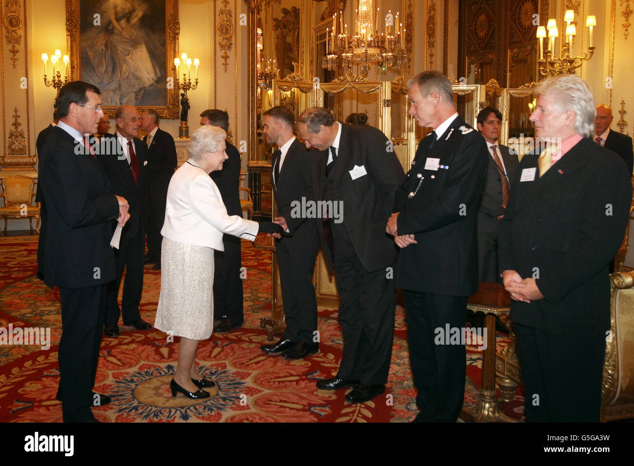 Queen honours Jubilee stars Stock Photo Alamy
