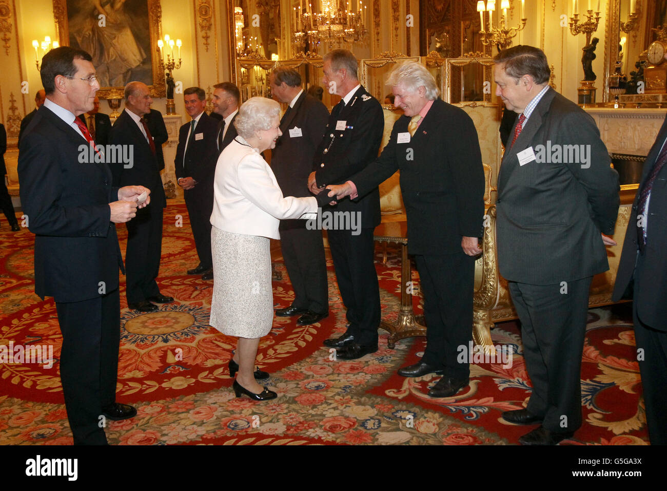 Queen honours Jubilee stars Stock Photo Alamy
