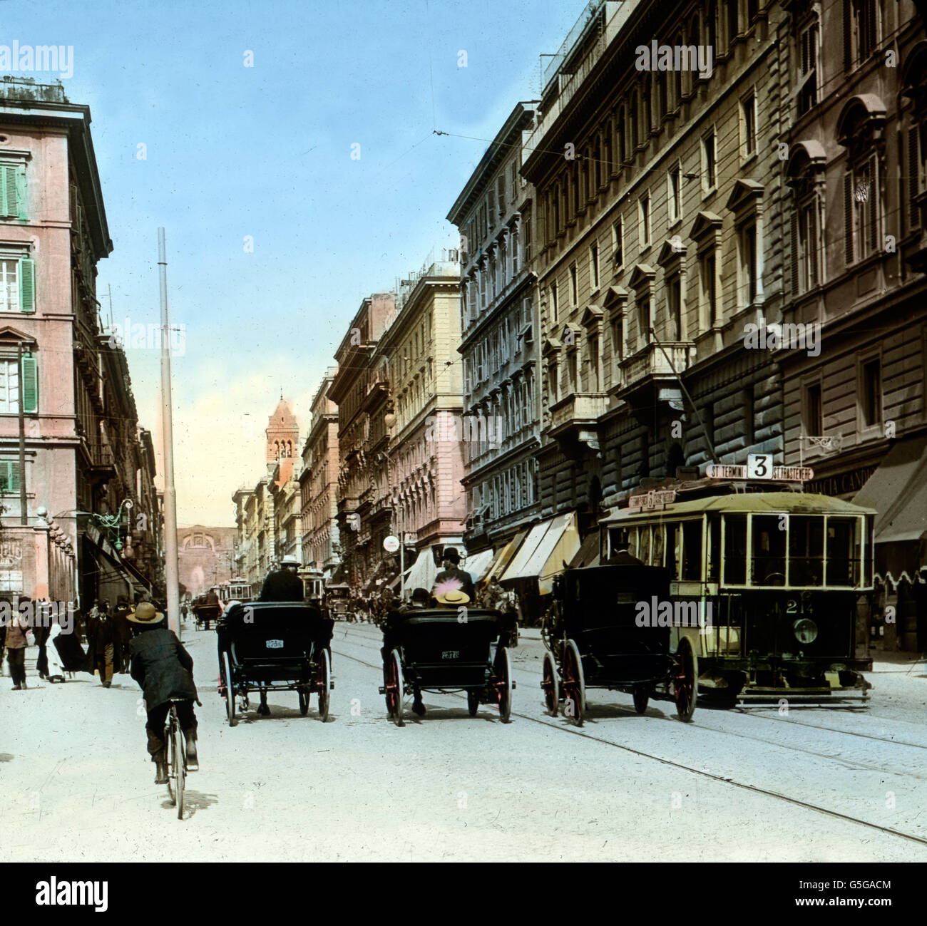 Die Via Nazionale in Rom. The Via Nazionale in the city of Rome. street, people, shops, tram,  bicycle, street life, city life, avenue, Europe, Italy, Rome, history, historical, 1910s, 1920s, 20th century, archive, Carl Simon, hand-coloured glass slide Stock Photo