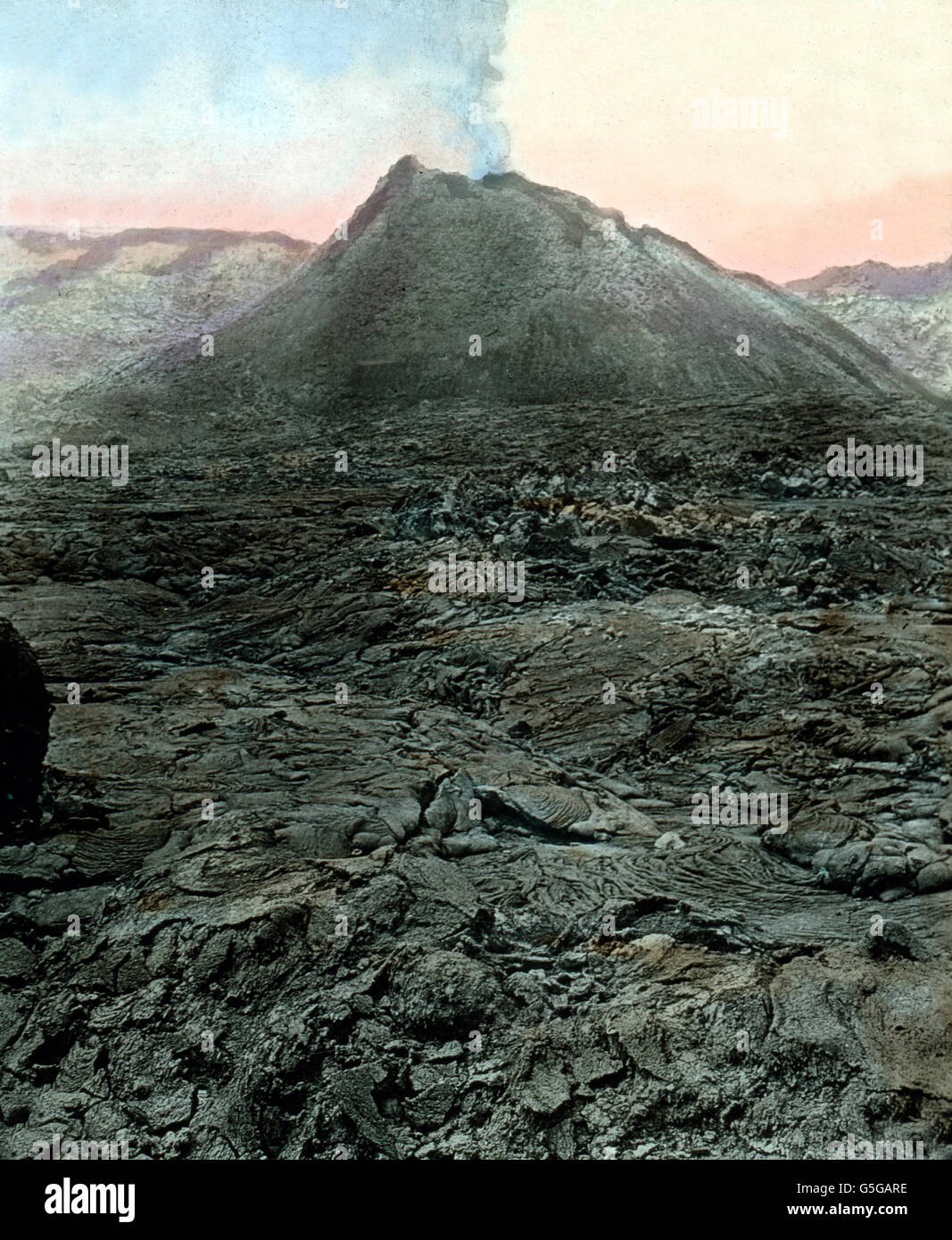 Ein Lavafeld am Vesuv. Dry lava at the Mount Vesuvius. volcano, lava, cloud, dust, ash, nature, spectacle, volcanicity, volcanism, geology, history, historical, 1910s, 1920s, 20th century, archive, Carl Simon, hand-coloured glass slide Stock Photo