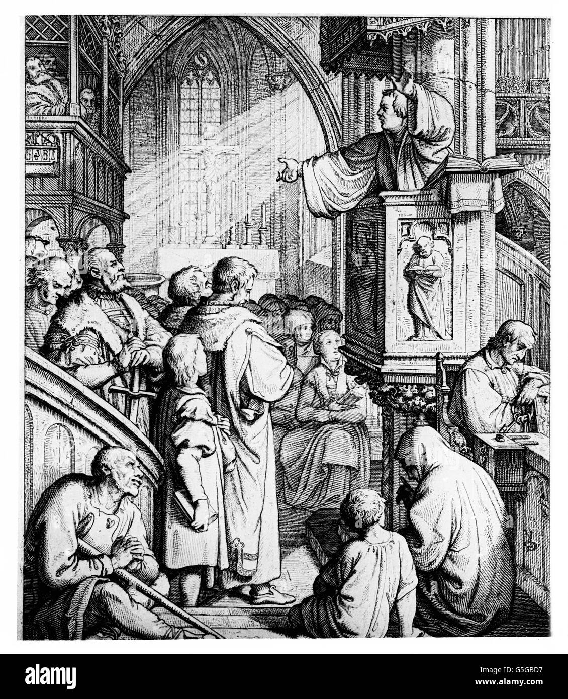 Martin Luther bei einer Predigt von der Kanzel zur Gemeinde. Martin Luther delivering a sermon from his pulpit to the community. Stock Photo