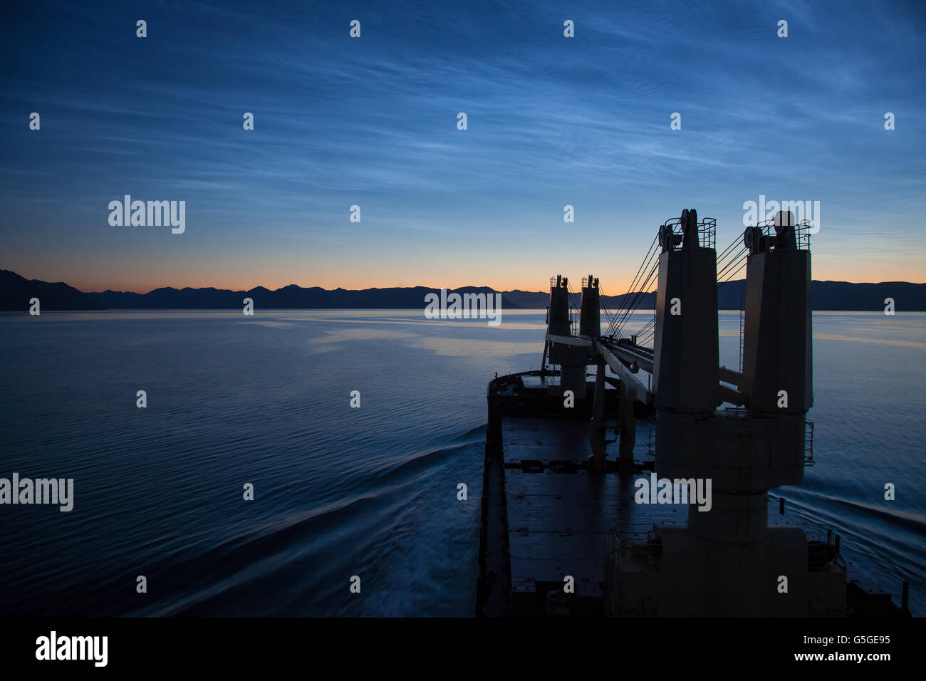 Cruise ship sailing in Alaska, at dusk Stock Photo - Alamy