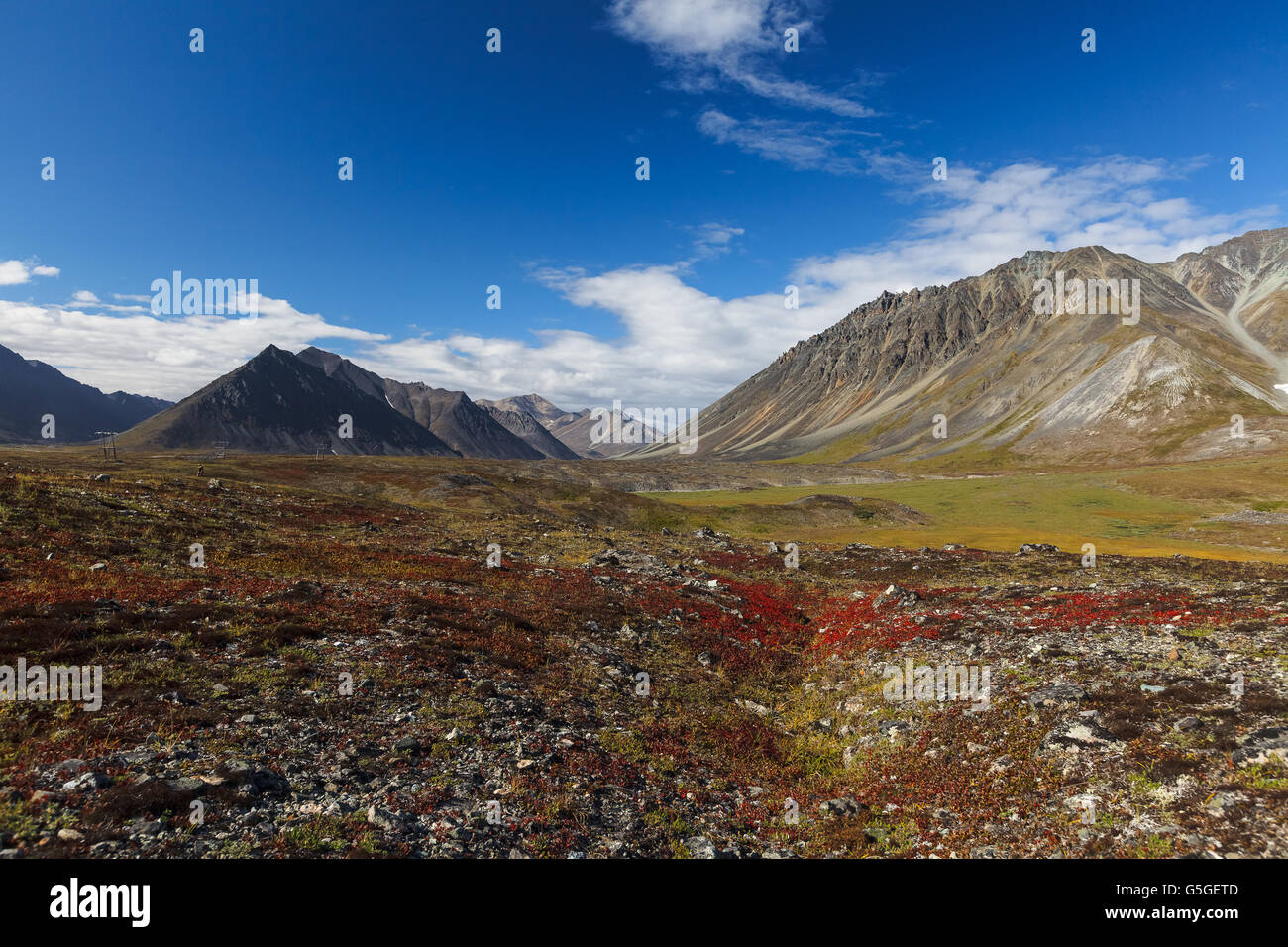 Colorful autumn tundra and river in Chukotka, Russia Stock Photo
