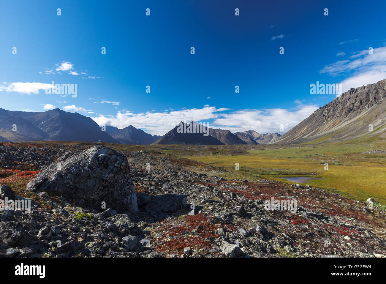 Colorful rocky tundra and river in Chukotka, Russia Stock Photo