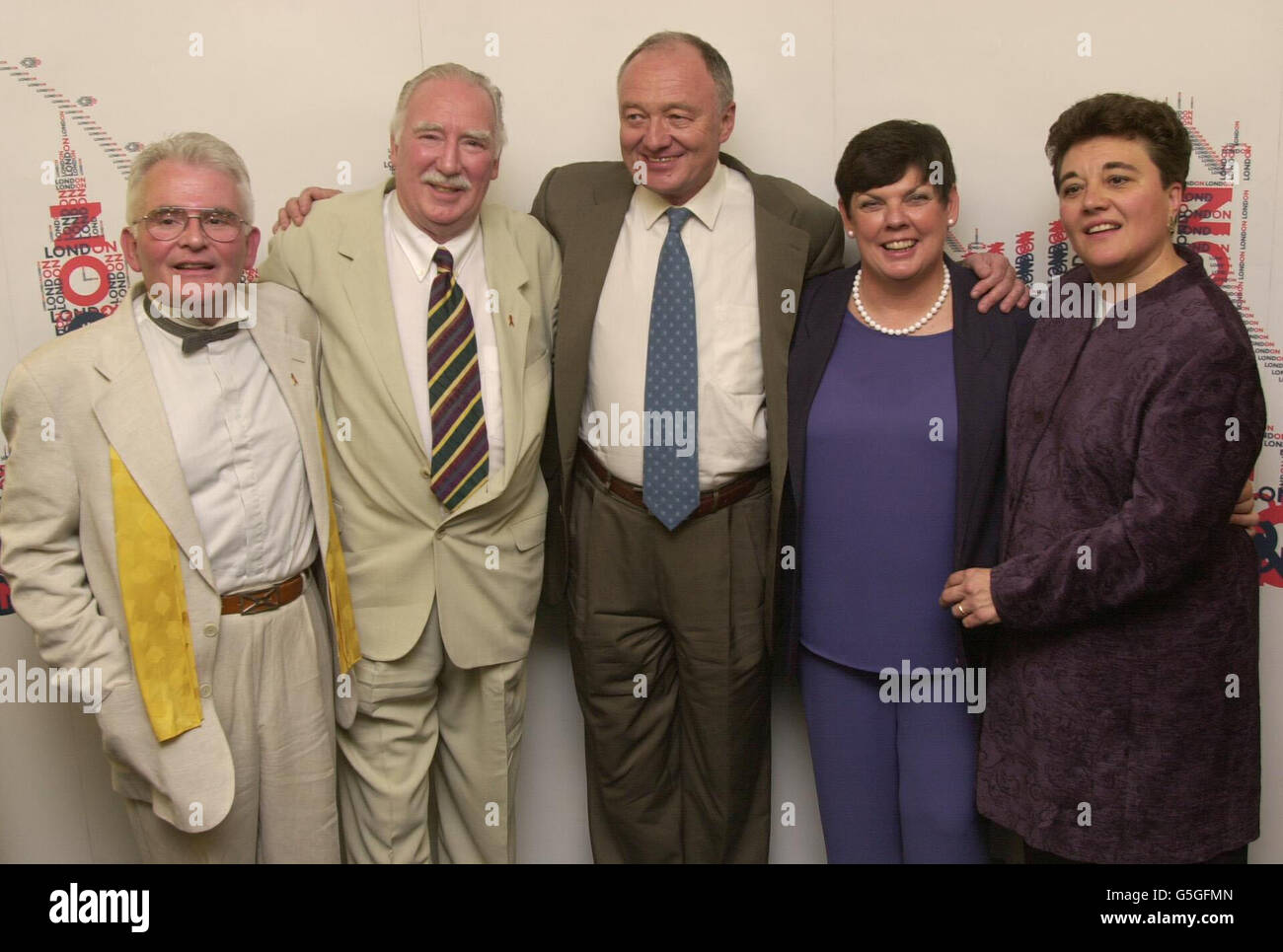 Couples, Alex Cannell (far left) and Ian Burford (left), with Carol Budd, (second right), and Linda Wilkinson, (far right), stand with London Mayor, Ken Livingstone at the Greater London Authority headquarters. * to celebrate the launch of Britain's first register for gay couples. Stock Photo