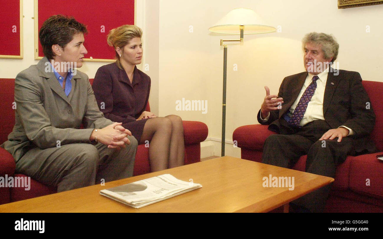 Wales First Minister Rhodri Morgan offers his personal condolences of to two of a visiting group of Pentagon officials - Adele Ratcliffe (left) from the US Office of Secretary of Defence and Tanya Litvanas of the US Army. * ... at the National Assembly For Wales in Cardiff. The group arrived in the UK before the terrorist attacks for a defence conference in London and had earlier been visiting Welsh companies. Stock Photo