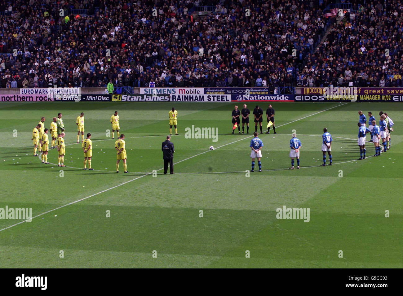 A minute's silence is held before the Nationwide Division One game between Manchester City v Birmingham at Maine Road, Manchester. NO UNOFFICIAL CLUB WEBSITE USE Stock Photo