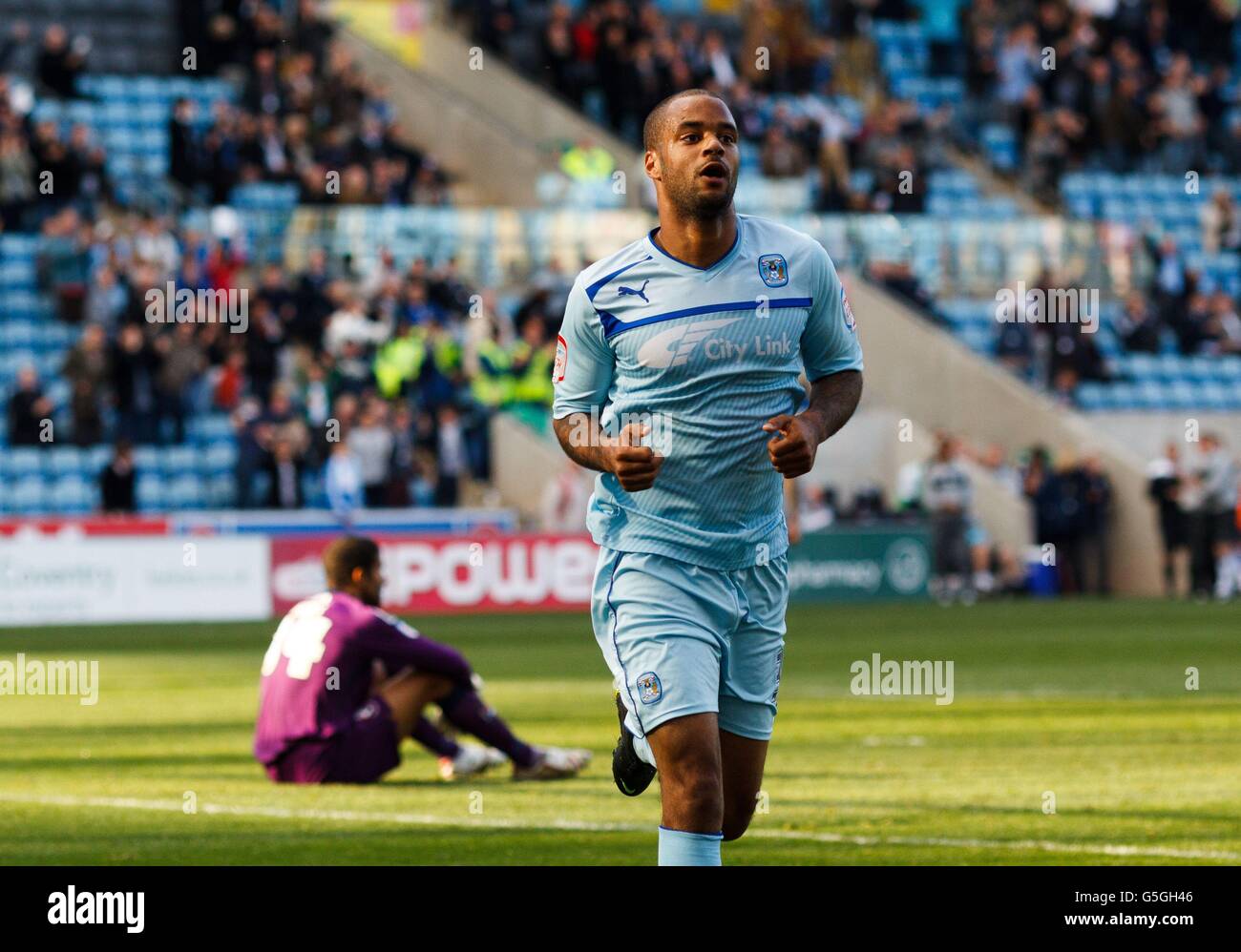 Coventry City's David McGoldrick celebrates scoring the only goal of the game during the npower Football League One match at the Ricoh Arena, Coventry. Stock Photo