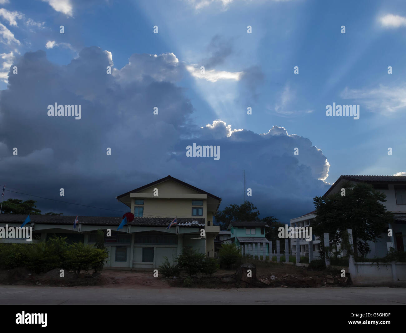 Blue sky with clouds and sun rays Stock Photo - Alamy