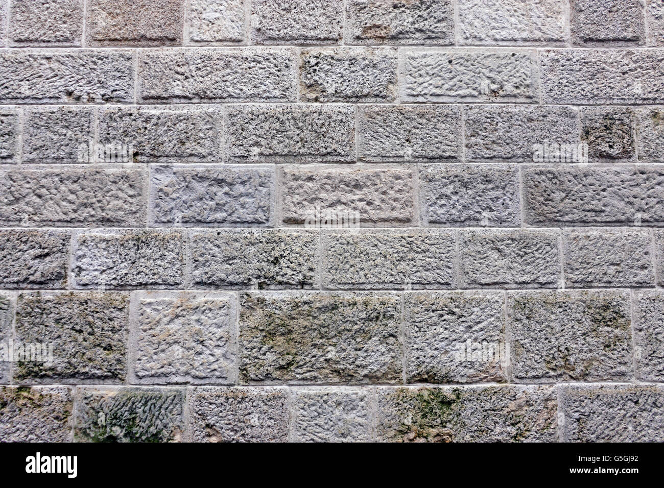 Closeup of a stone wall texture background Stock Photo - Alamy