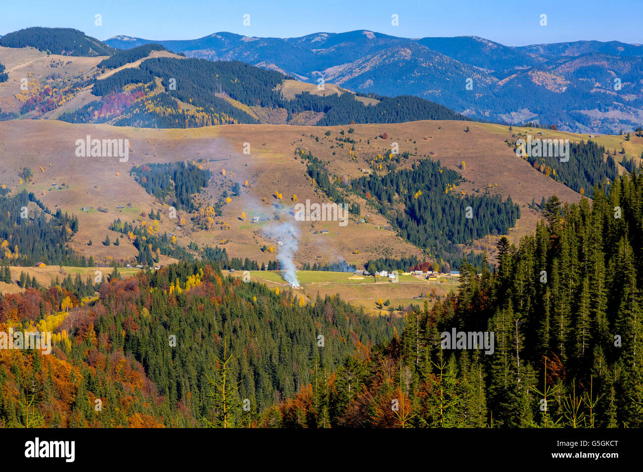 European Country Landscape of Mountains Forest and Village Stock Photo