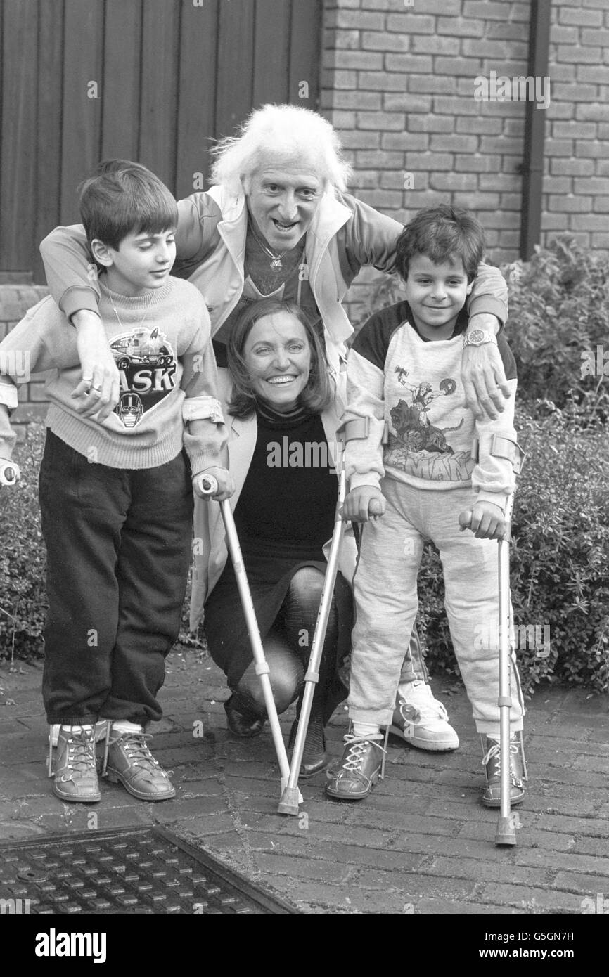 Jimmy Savile And Dr Pauline Cutting Pose Between Two Victims Of War Jimmy Savile And Dr Pauline Cutting Pose Between Two Victims Of War