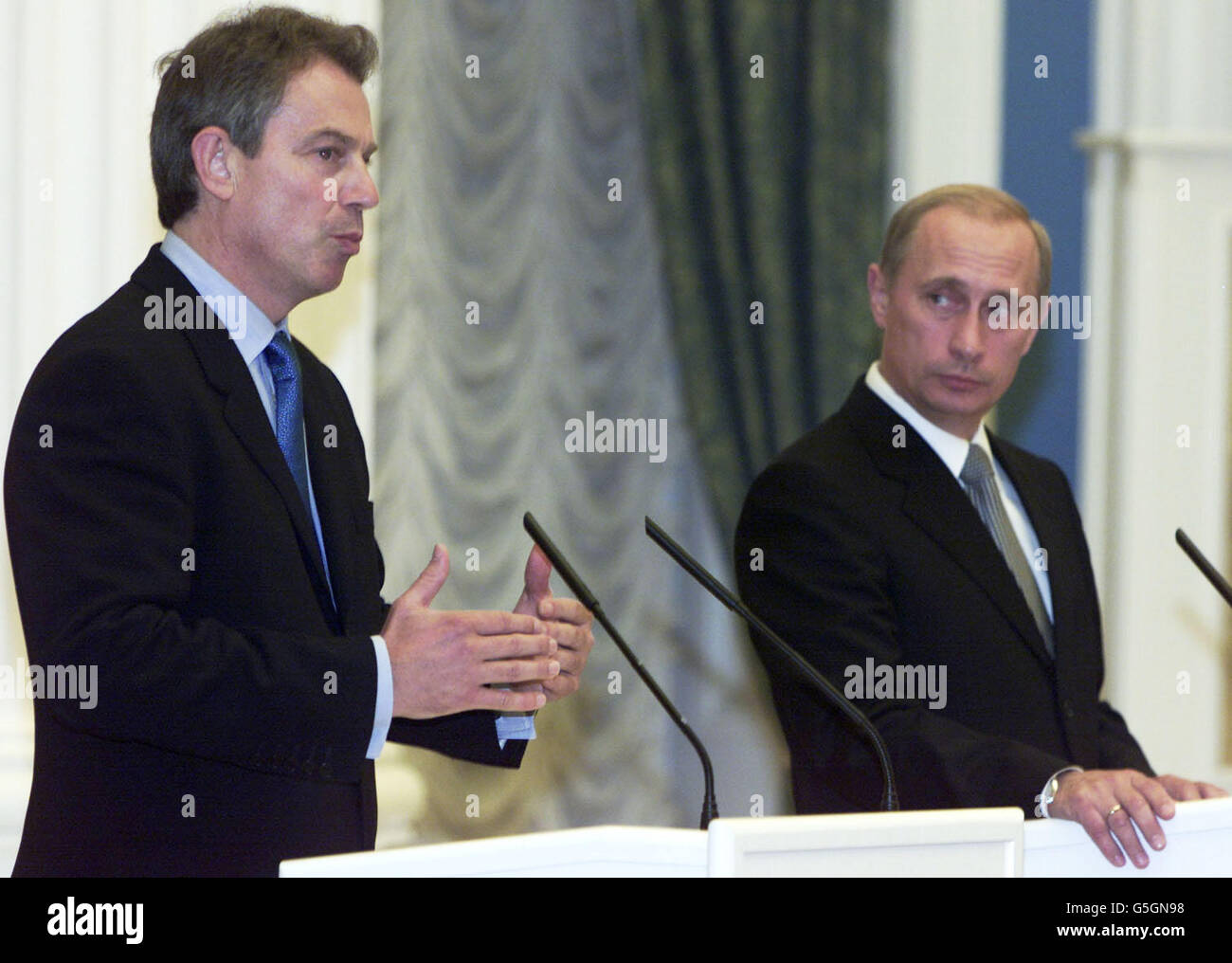 Britain's Prime Minister Tony Blair (left) holds a press conference with Russian President Vladimir Putin at the Kremlin. Mr Blair's visit to Russia and meeting with Russian president Vladimir Putin is part of the coalition building process. * ... to identify those responsible for the attacks on the U.S. on September 11th. Blair and Putin are expected to discuss the evidence paper on prime suspect Osama bin Laden as well as the humanitarian efforts to be undertaken to help refugees. Stock Photo