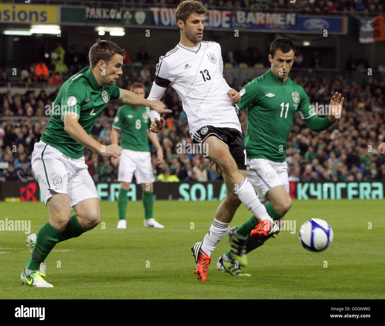 Republic of Ireland's Keith Fahey (right) and Germanys Miroslav Klose in action during the 2014 FIFA World Cup Qualifying match at the Aviva Stadium, Dublin, Ireland. Stock Photo